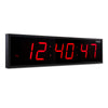 Digital clock with red LED display on a white background